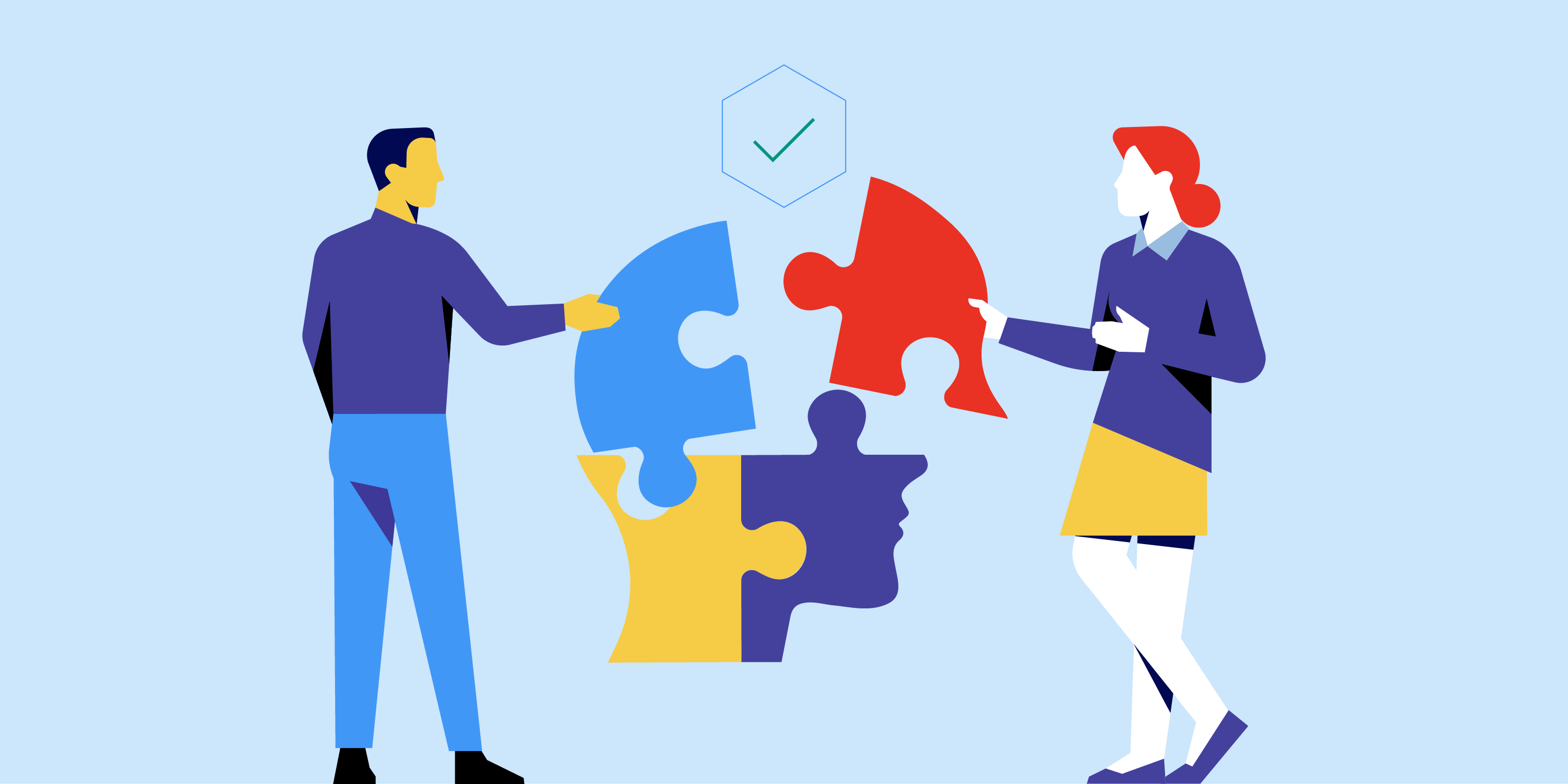 A recruiter and employee put together puzzle pieces to shape a human head.